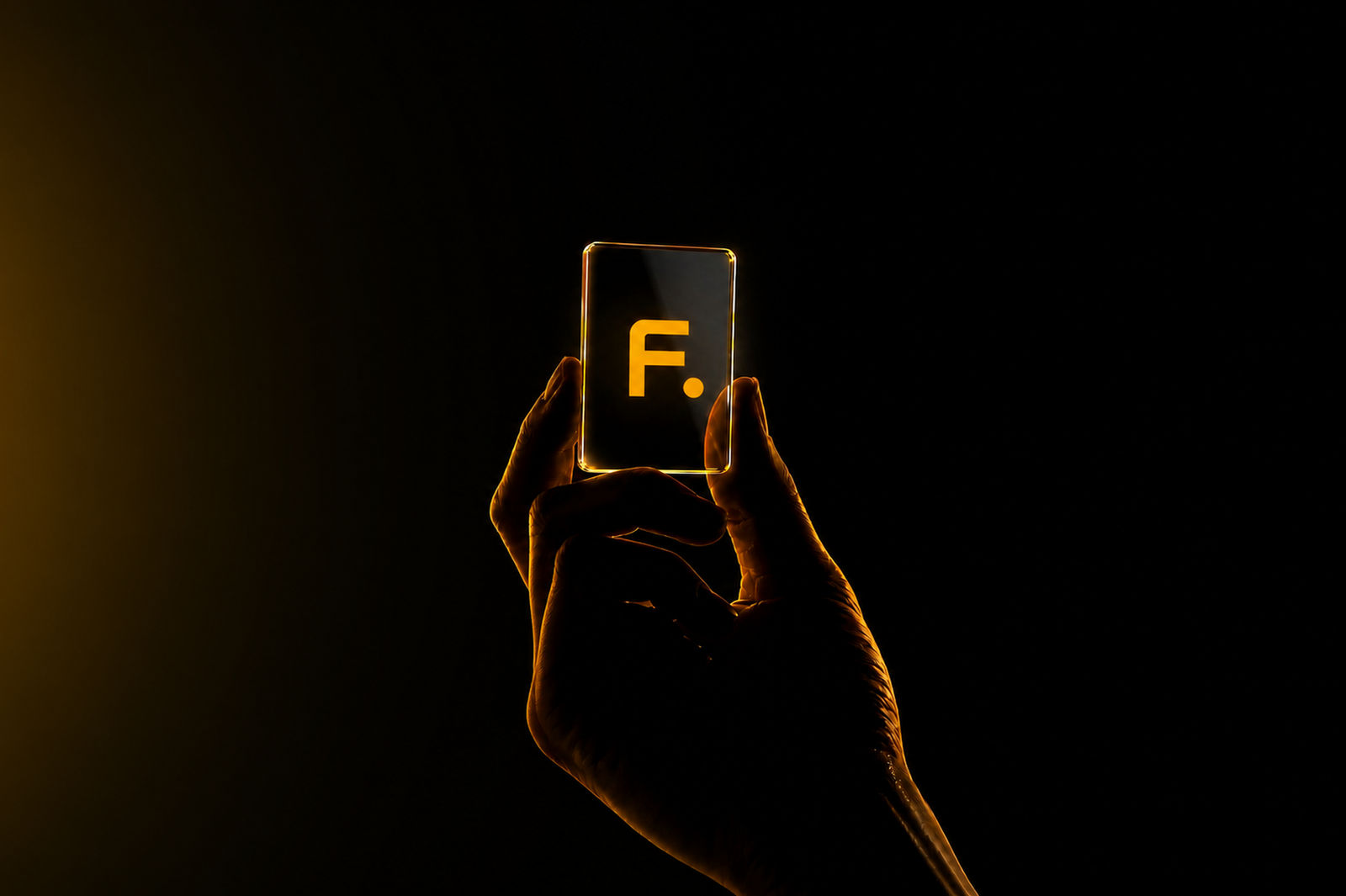Hands holding a transparent card with the Flinch F mark